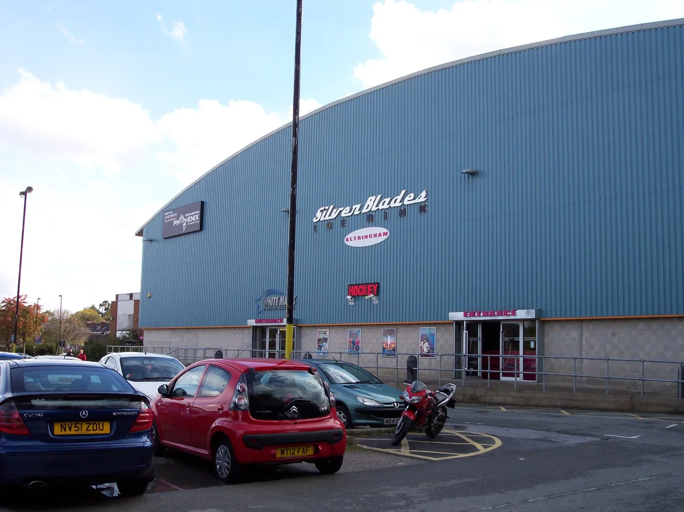 Altrincham Ice Rink on Oakfield Road, with part of the surface car park in front. The rink has since been rebranded and now trades as Planet Ice.