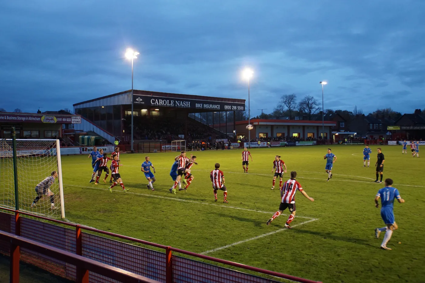 Altrincham in action under the floodlights at the J.Davidson Stadium, Moss Lane