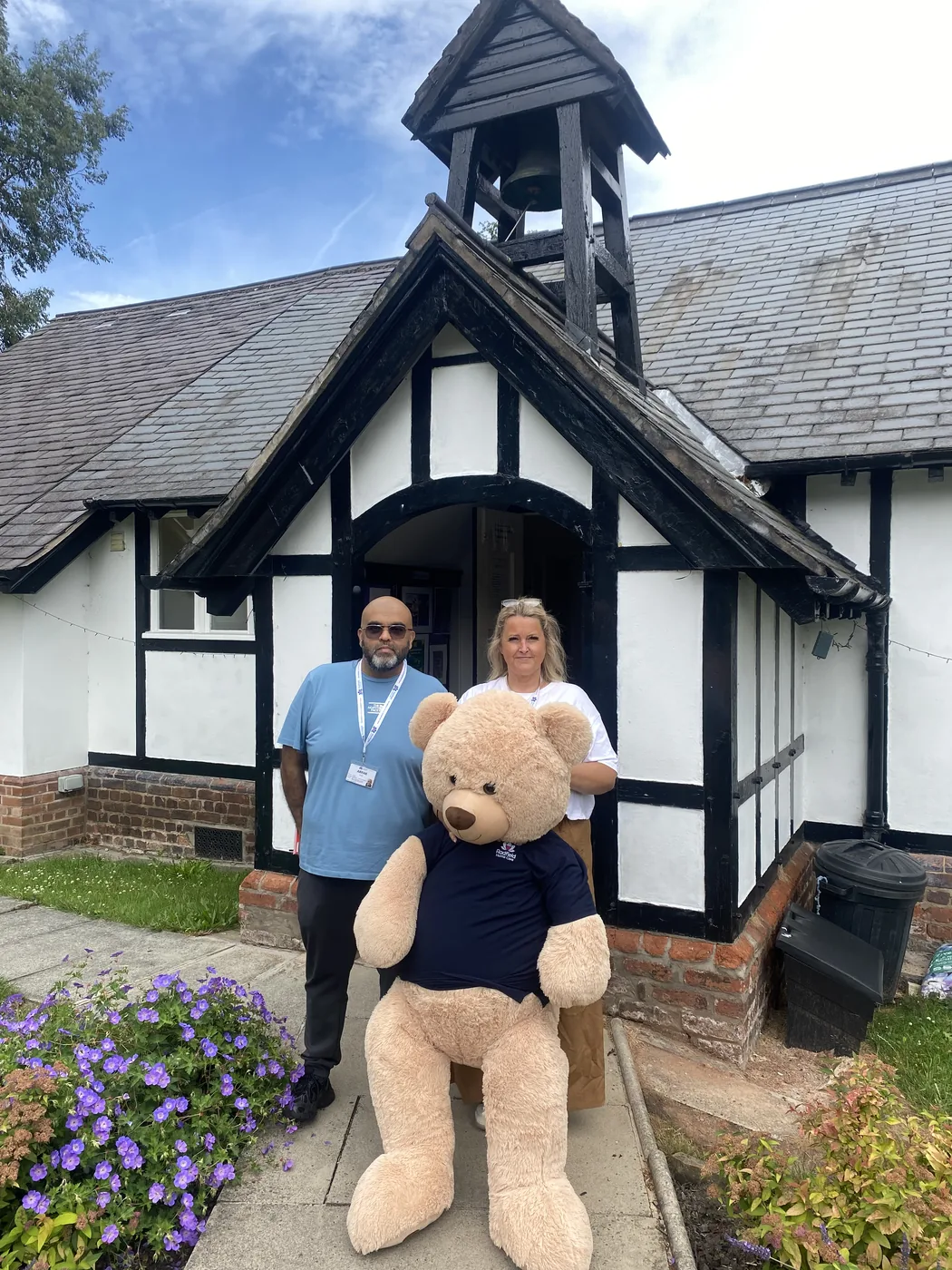 St Luke's Church in Bowdon, where the Radfield Club meets, with a teddy bear in a Radfield top at the door